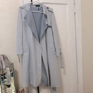 NEVER WORN; pale blue suede type trench coat. Comes with 2 different size belts.